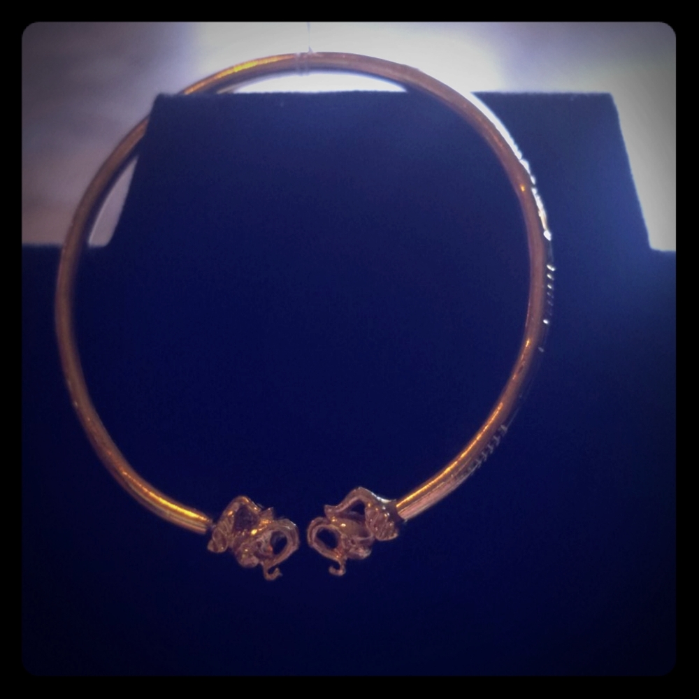 Gold tone elephant bracelet